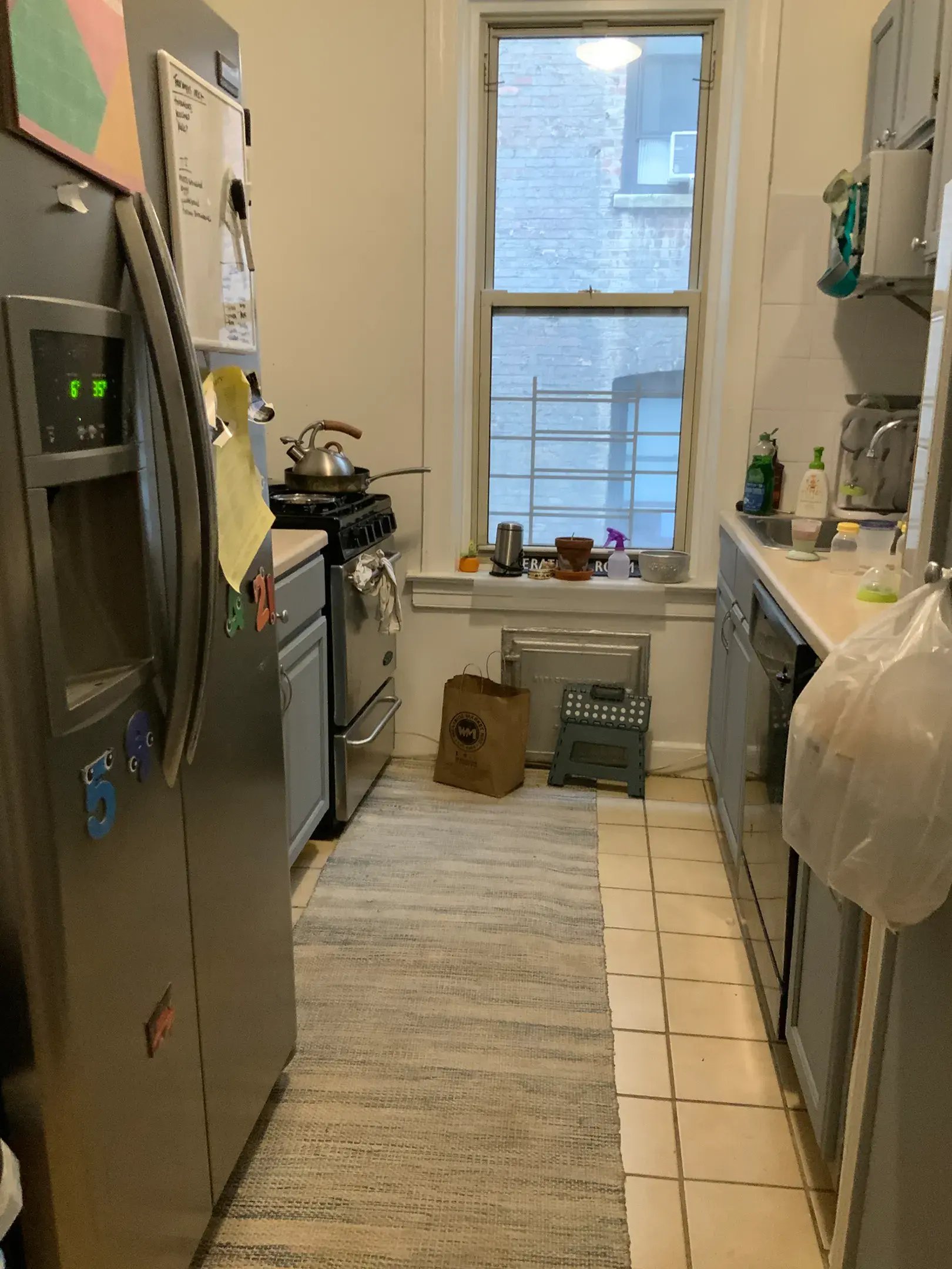 Before the remodel: a cramped, closed-off galley kitchen