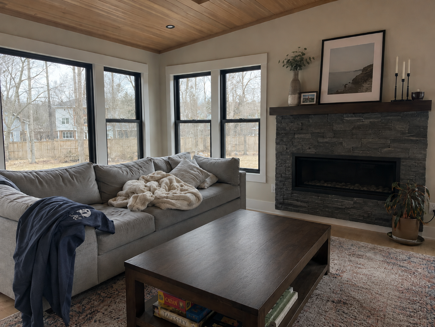 Dark Stone Tongue and Groove Ceiling Sunroom Fireplace