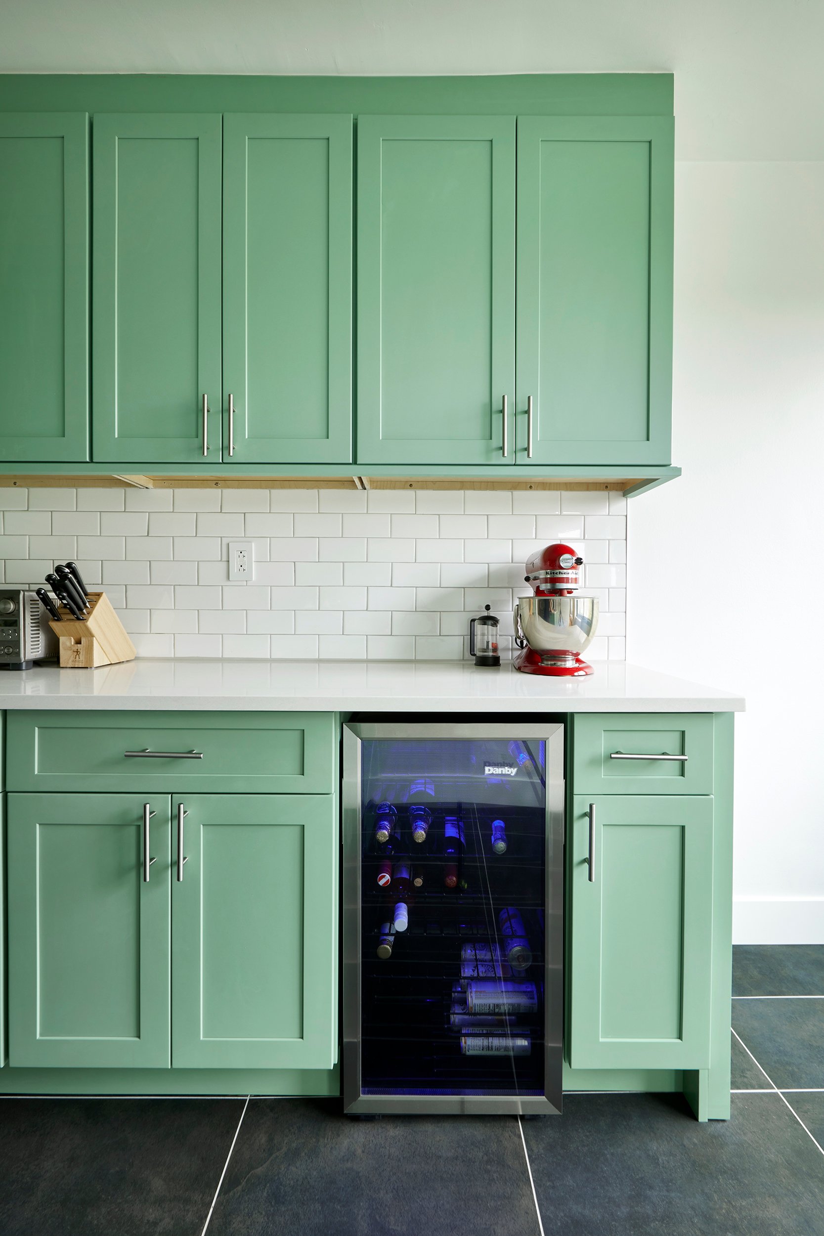 Mint green condo kitchen in NYC